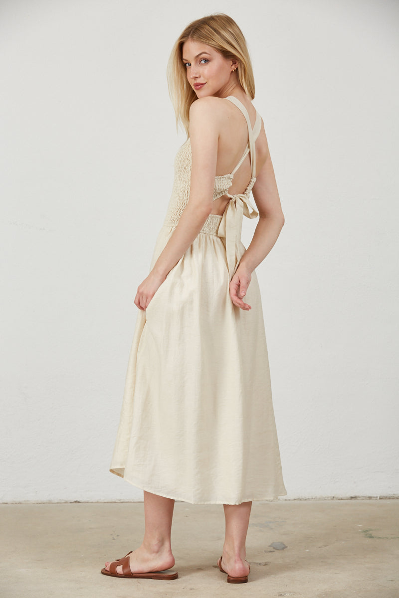 SMOCKED TOP SIDE POCKETS MIDI DRESS