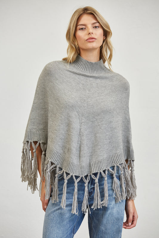 FRINGE MOCK NECK KNIT PANCHO SWEATER