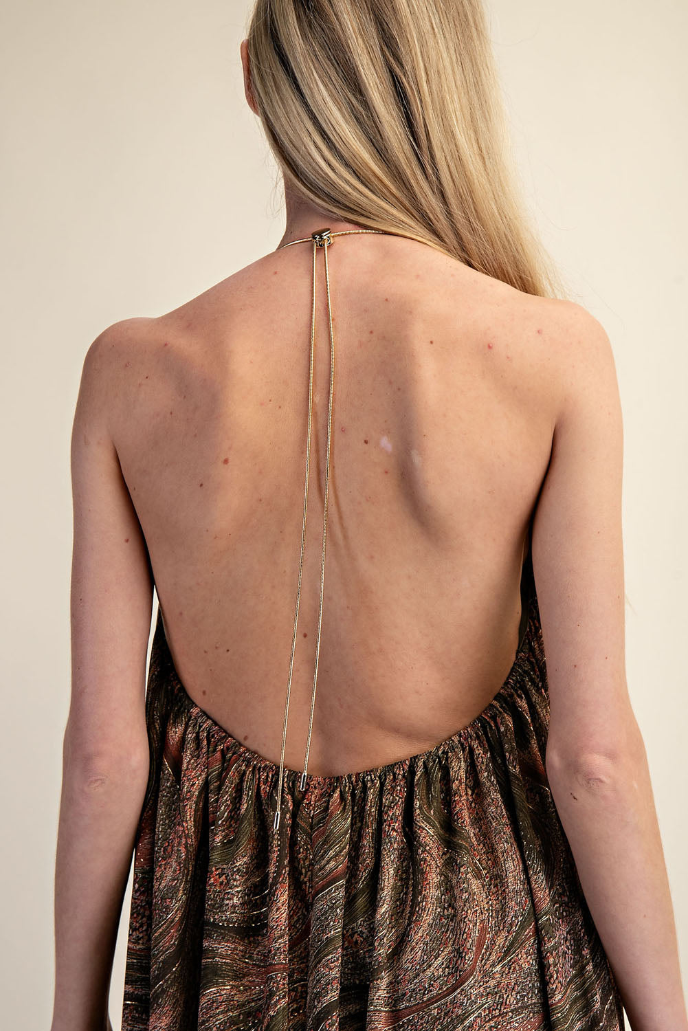 PRINTED HALTER OPEN BACK FLOW MAXI DRESS