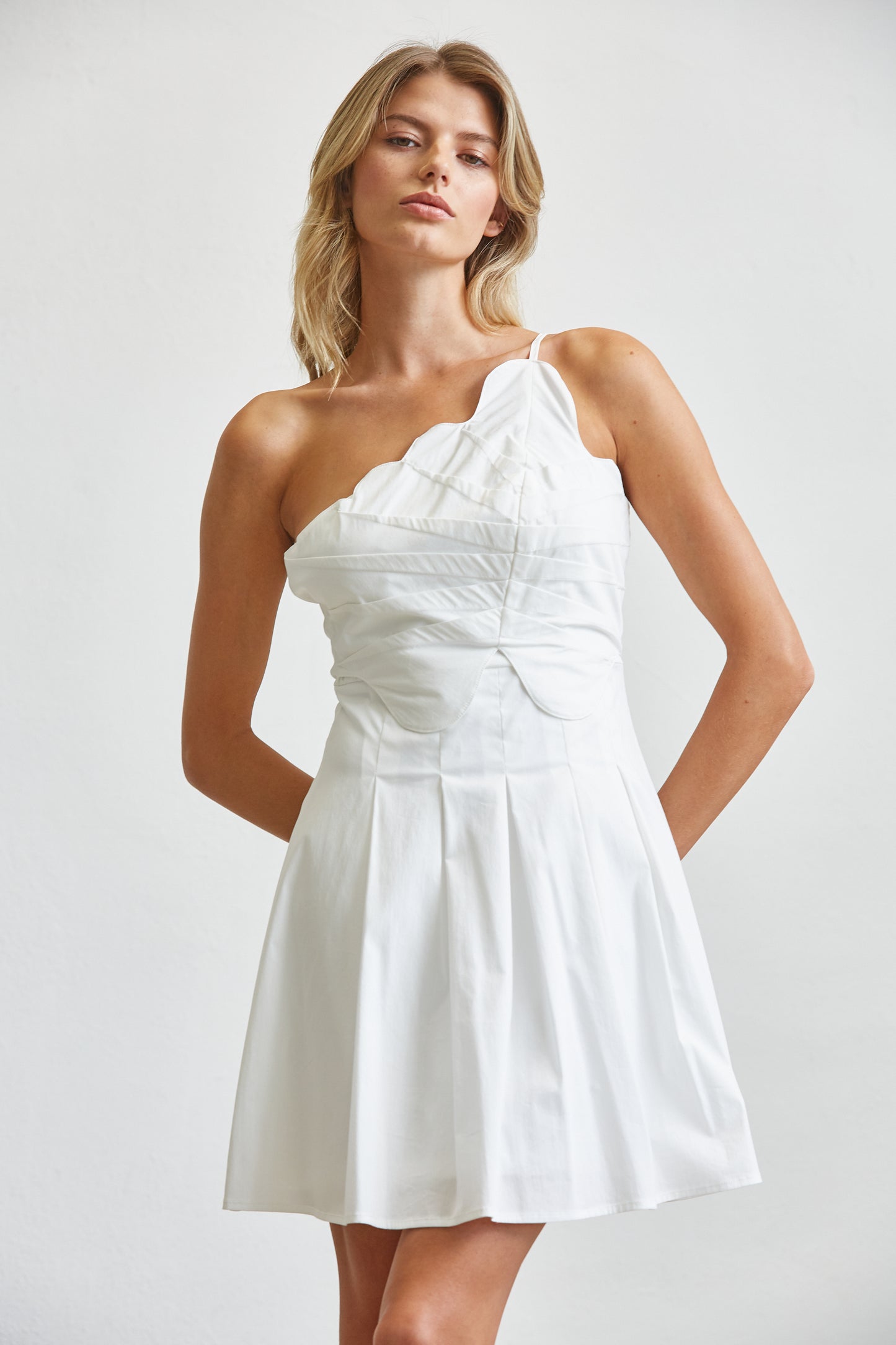 CONTOUR PLEATED MINI DRESS - MATCHA