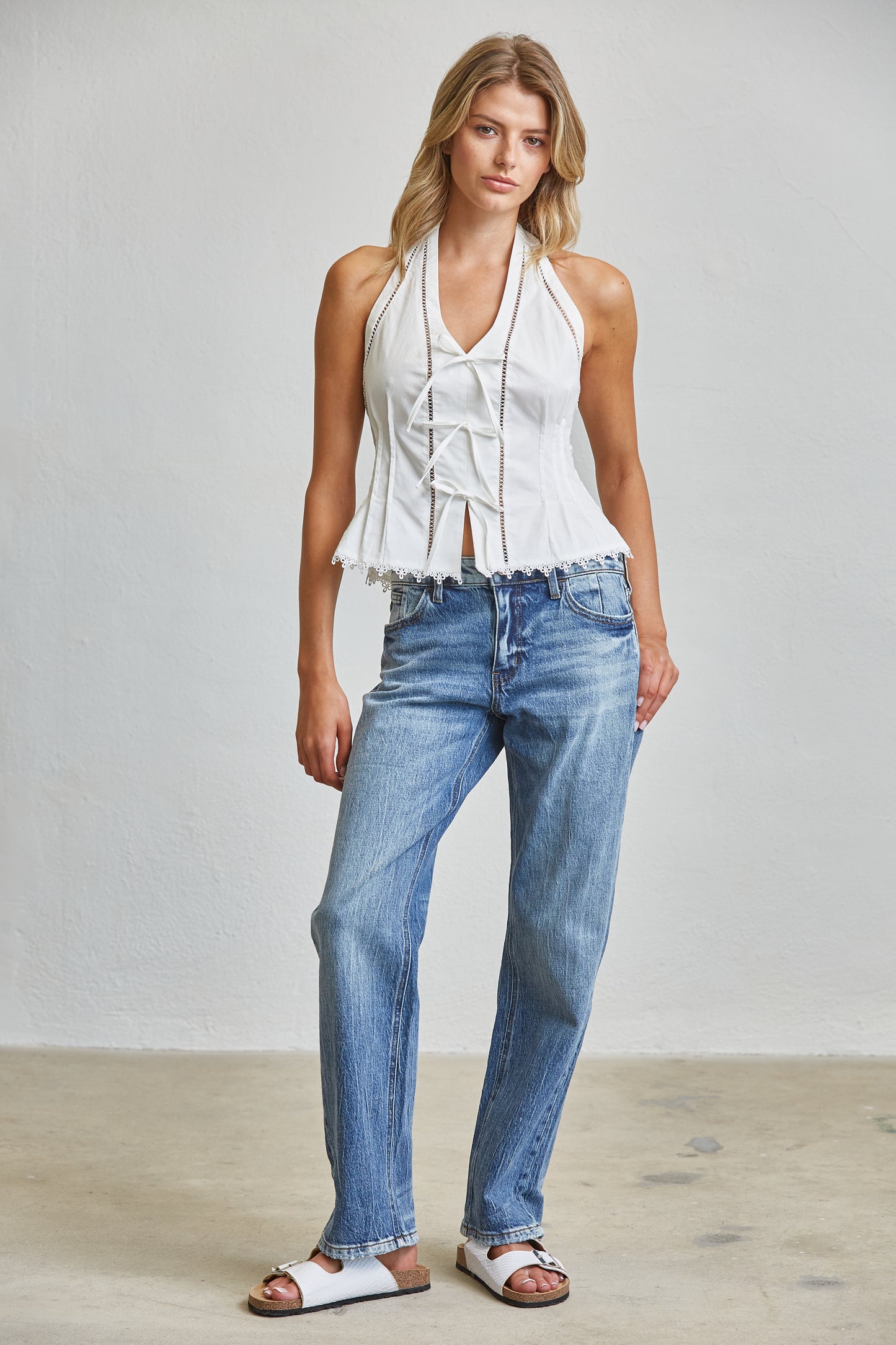 TIE ACCENT CHARM HALTER PEPLUM TOP