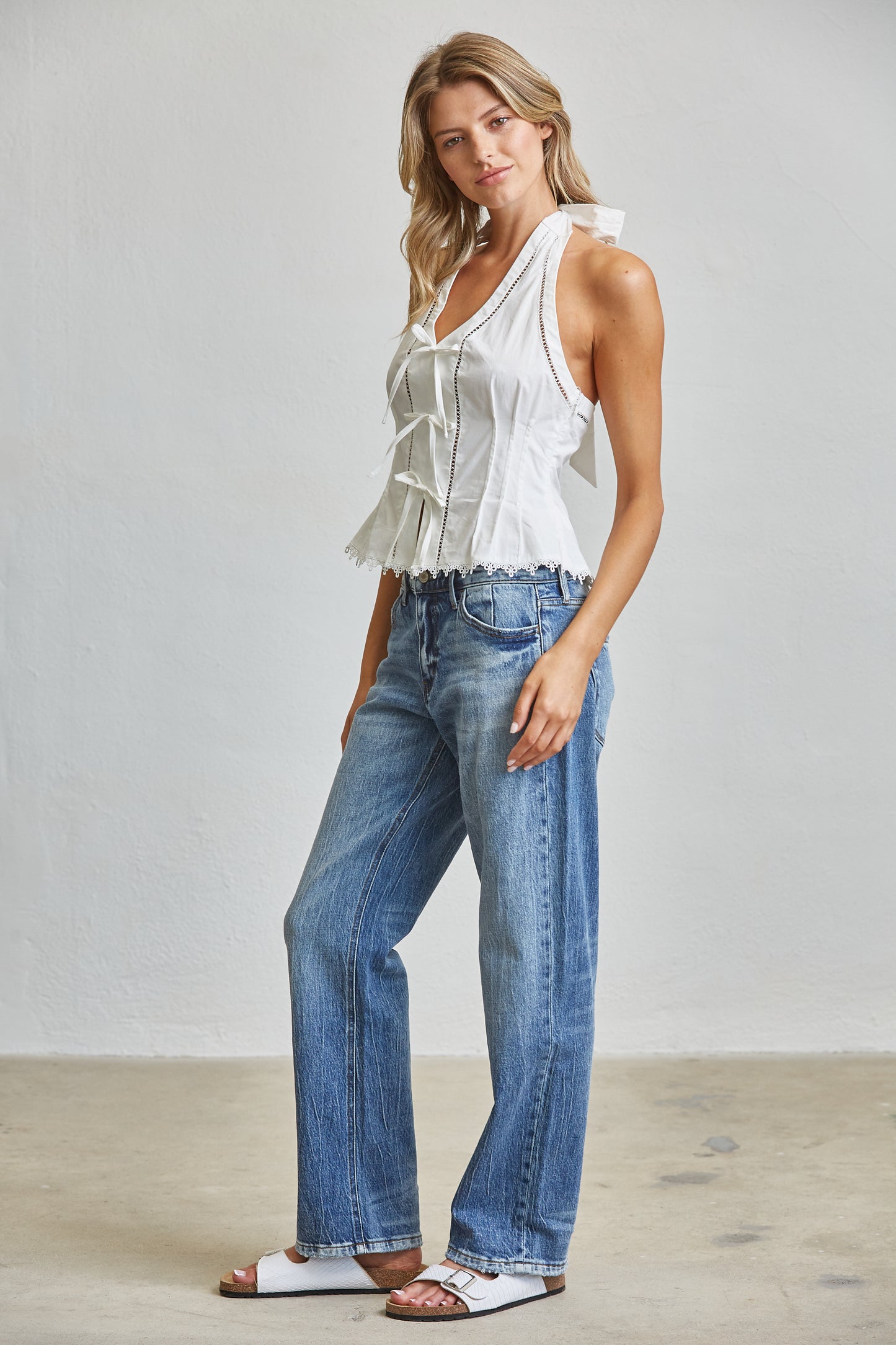 TIE ACCENT CHARM HALTER PEPLUM TOP