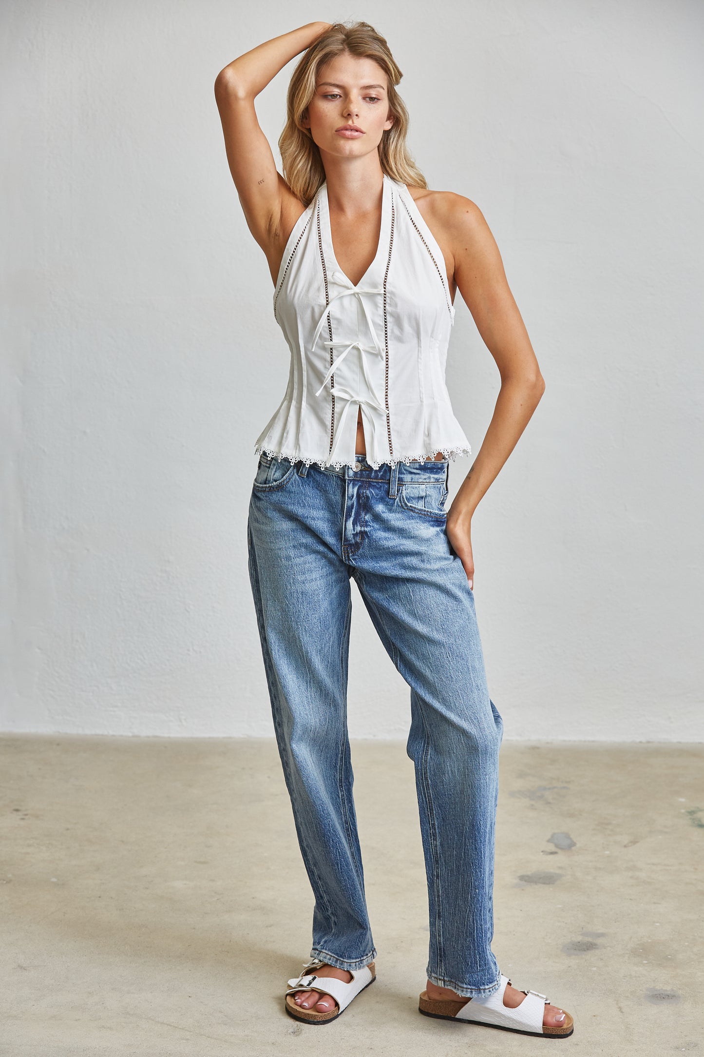 TIE ACCENT CHARM HALTER PEPLUM TOP