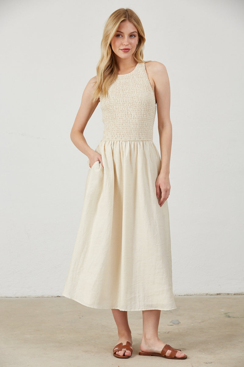 SMOCKED TOP SIDE POCKETS MIDI DRESS