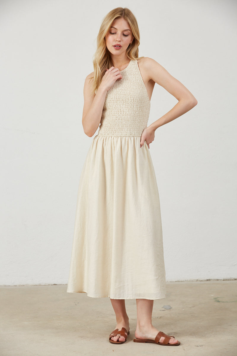 SMOCKED TOP SIDE POCKETS MIDI DRESS