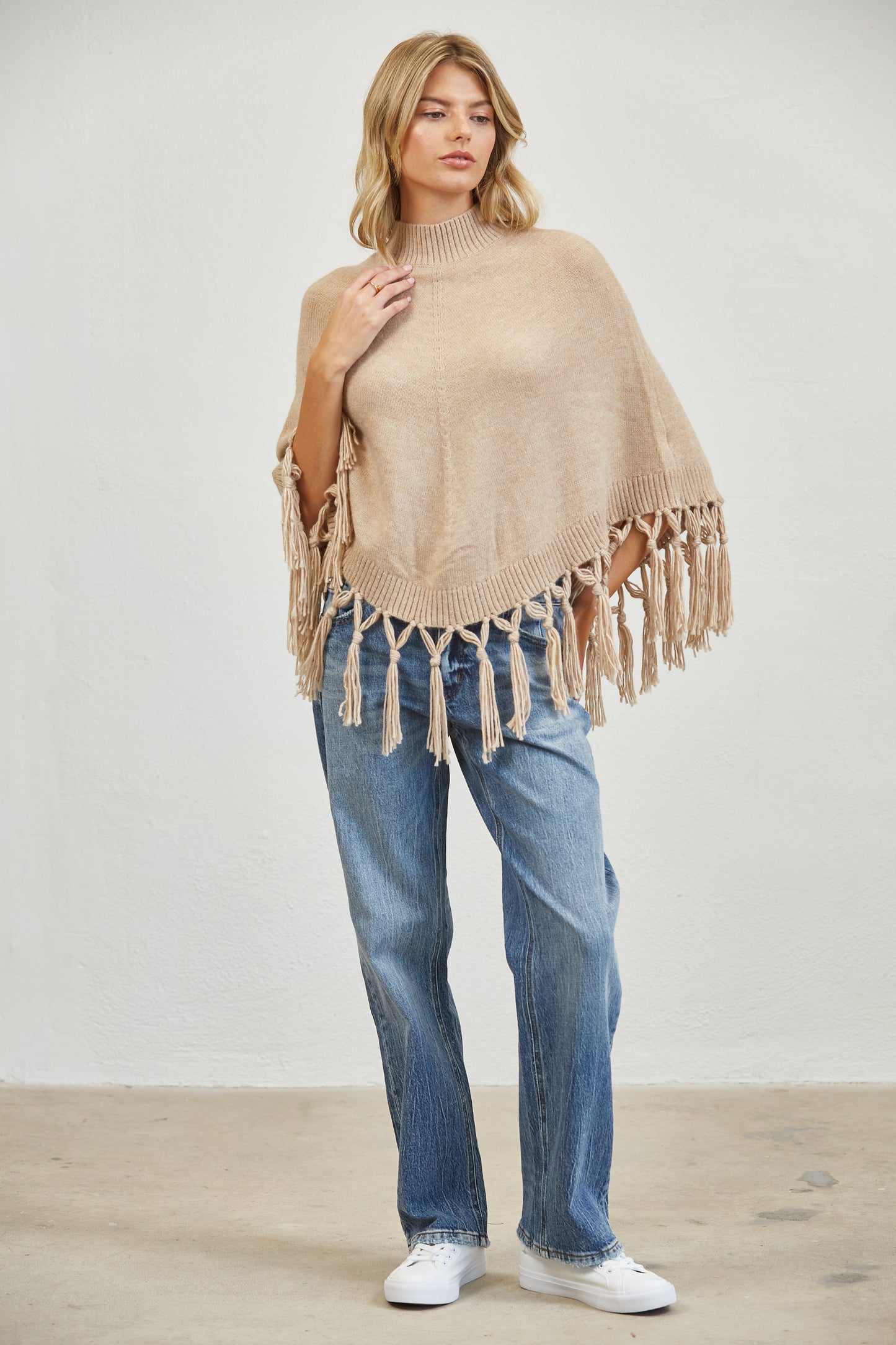 FRINGE MOCK NECK KNIT PANCHO SWEATER