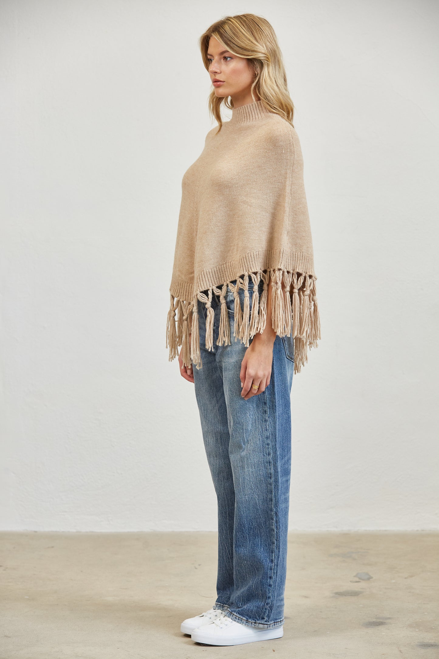 FRINGE MOCK NECK KNIT PANCHO SWEATER
