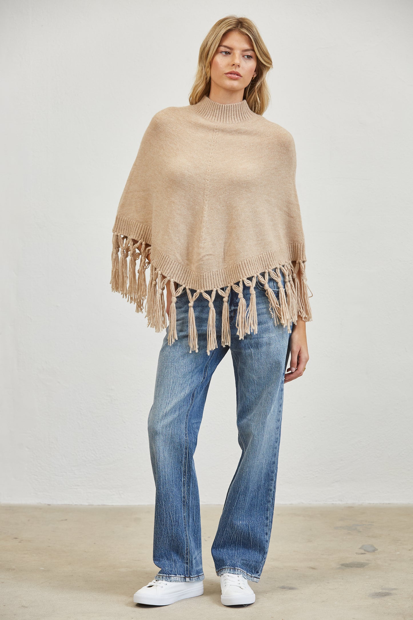 FRINGE MOCK NECK KNIT PANCHO SWEATER