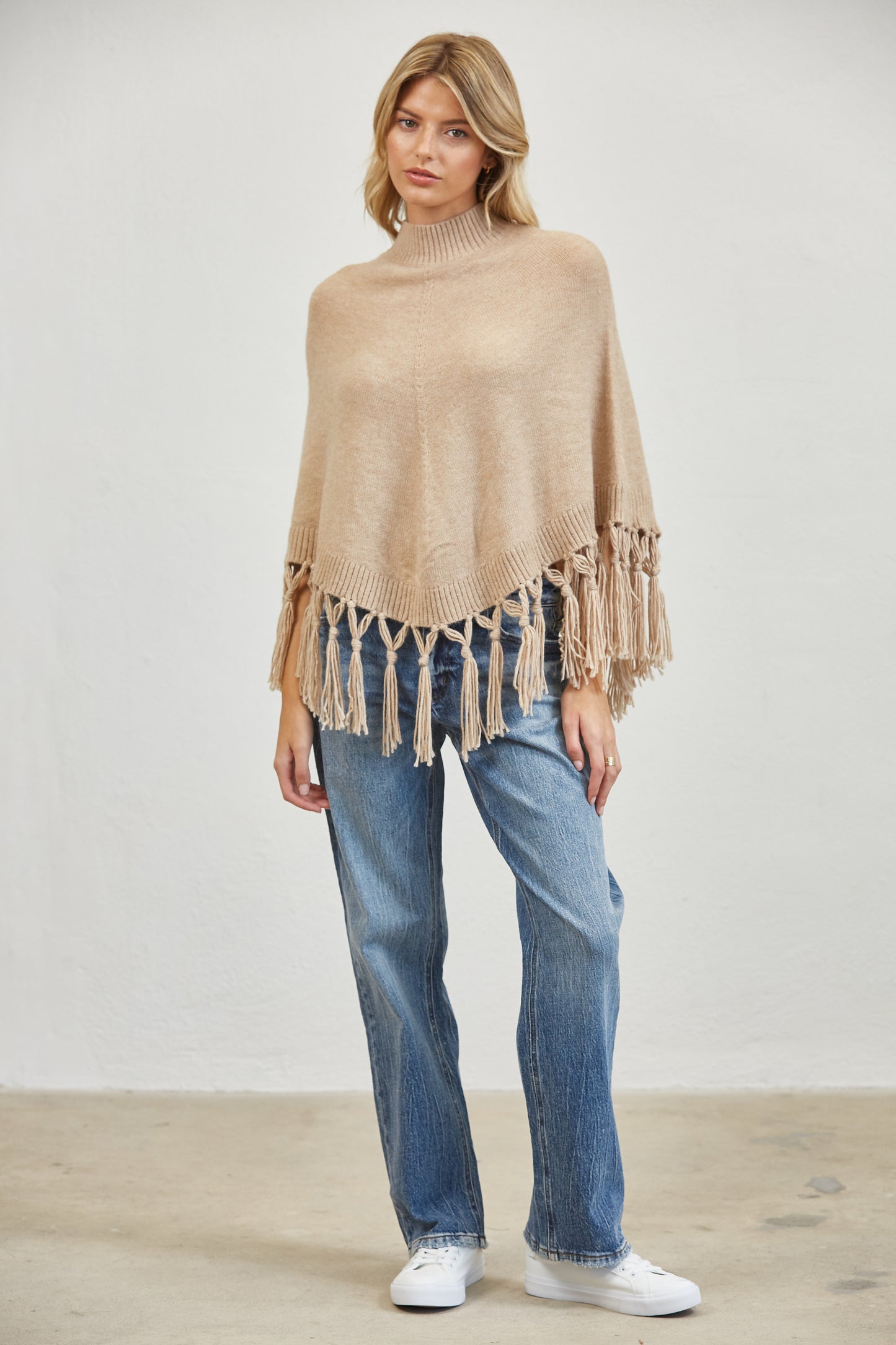 FRINGE MOCK NECK KNIT PANCHO SWEATER