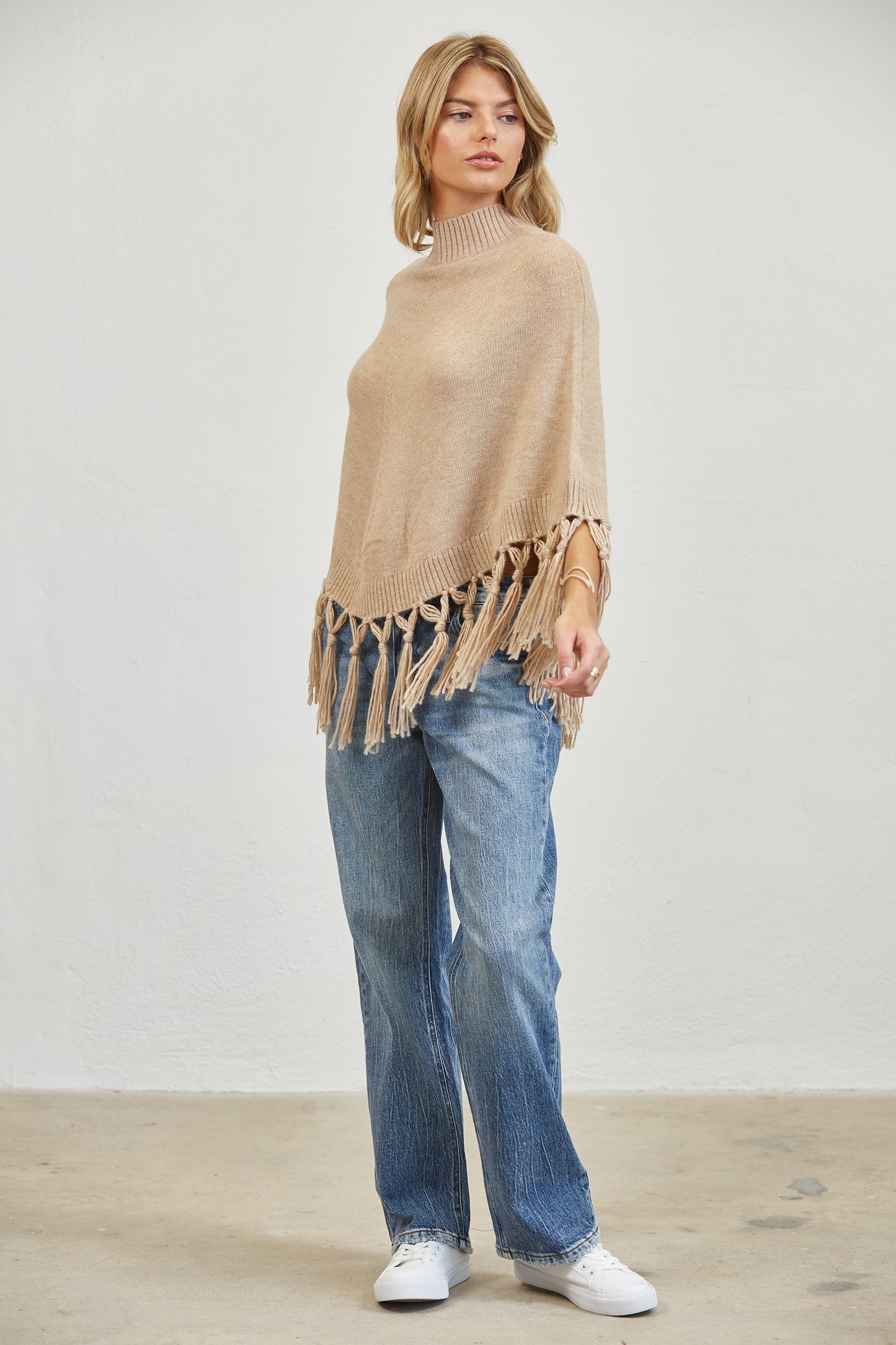 FRINGE MOCK NECK KNIT PANCHO SWEATER