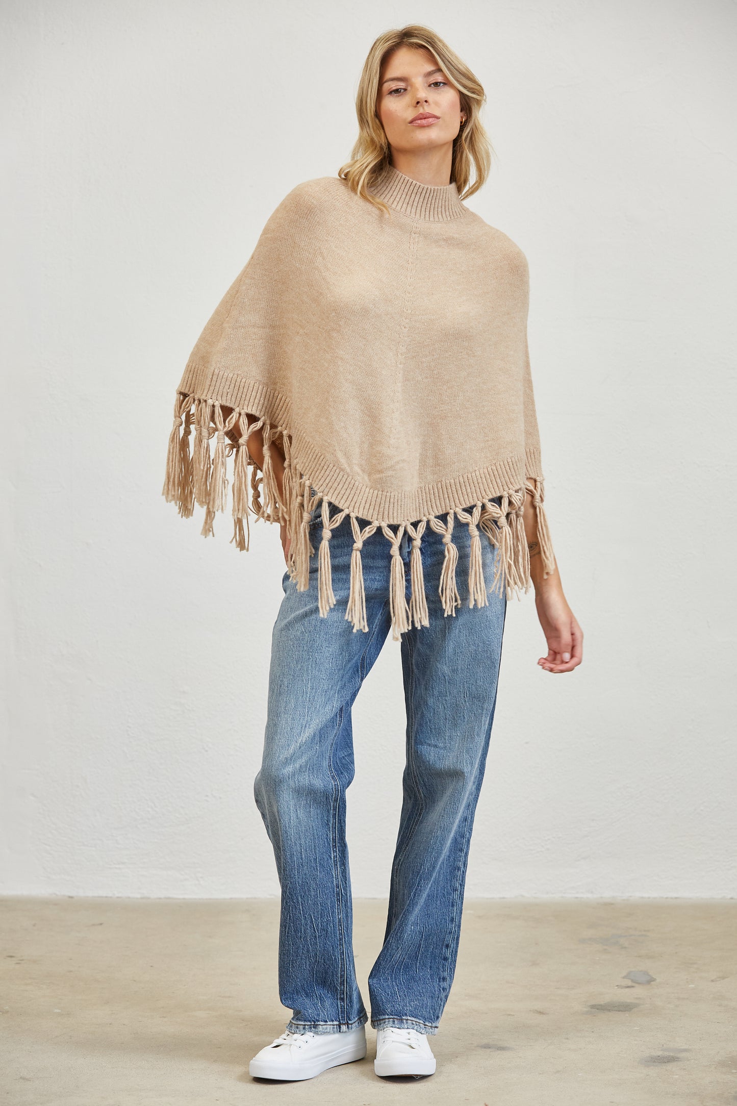 FRINGE MOCK NECK KNIT PANCHO SWEATER