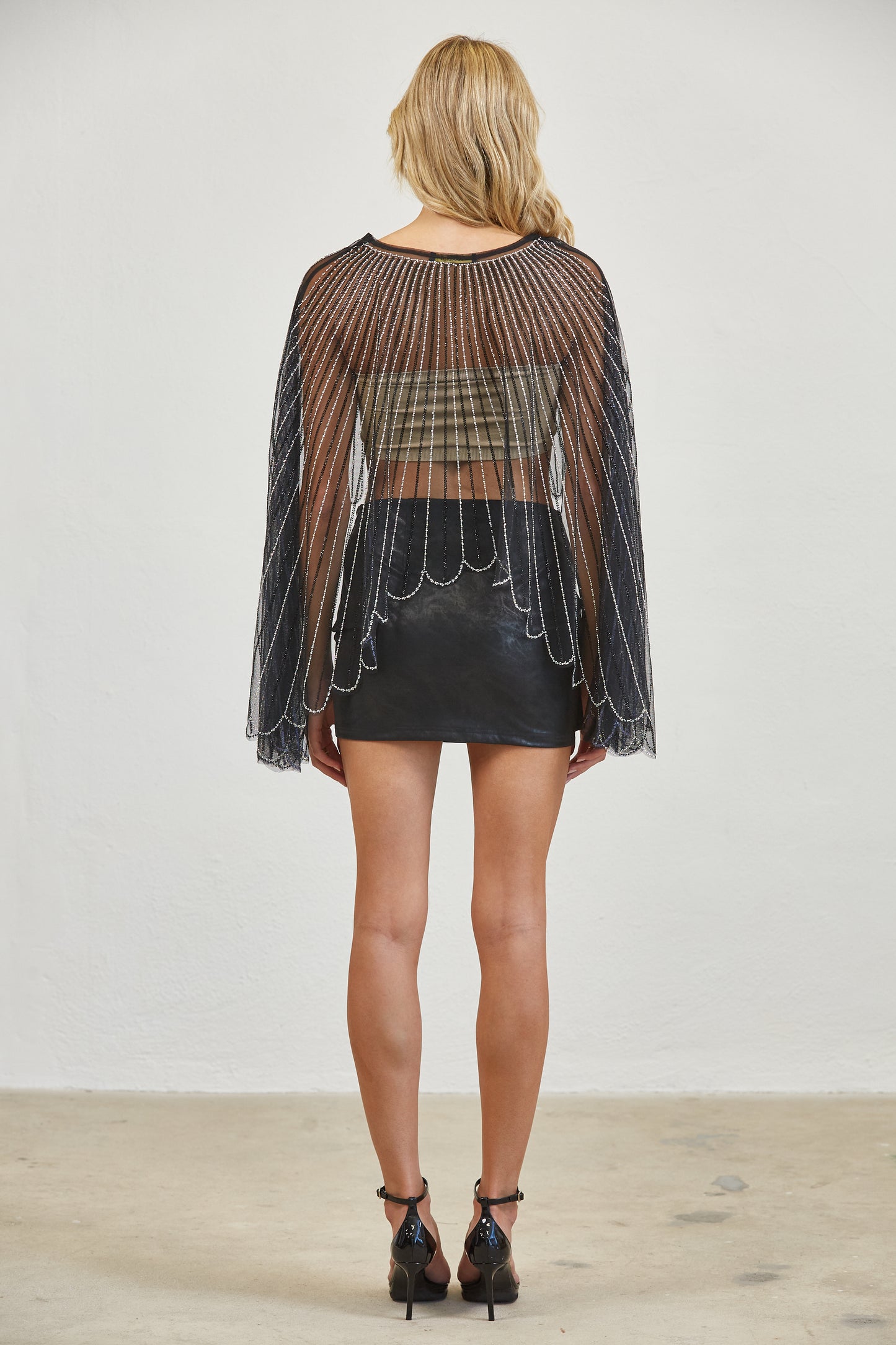 FRONT KNOT FAUX LEATHER MINI SKIRT